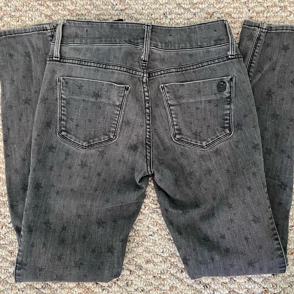 Black Orchid distressed jeans.